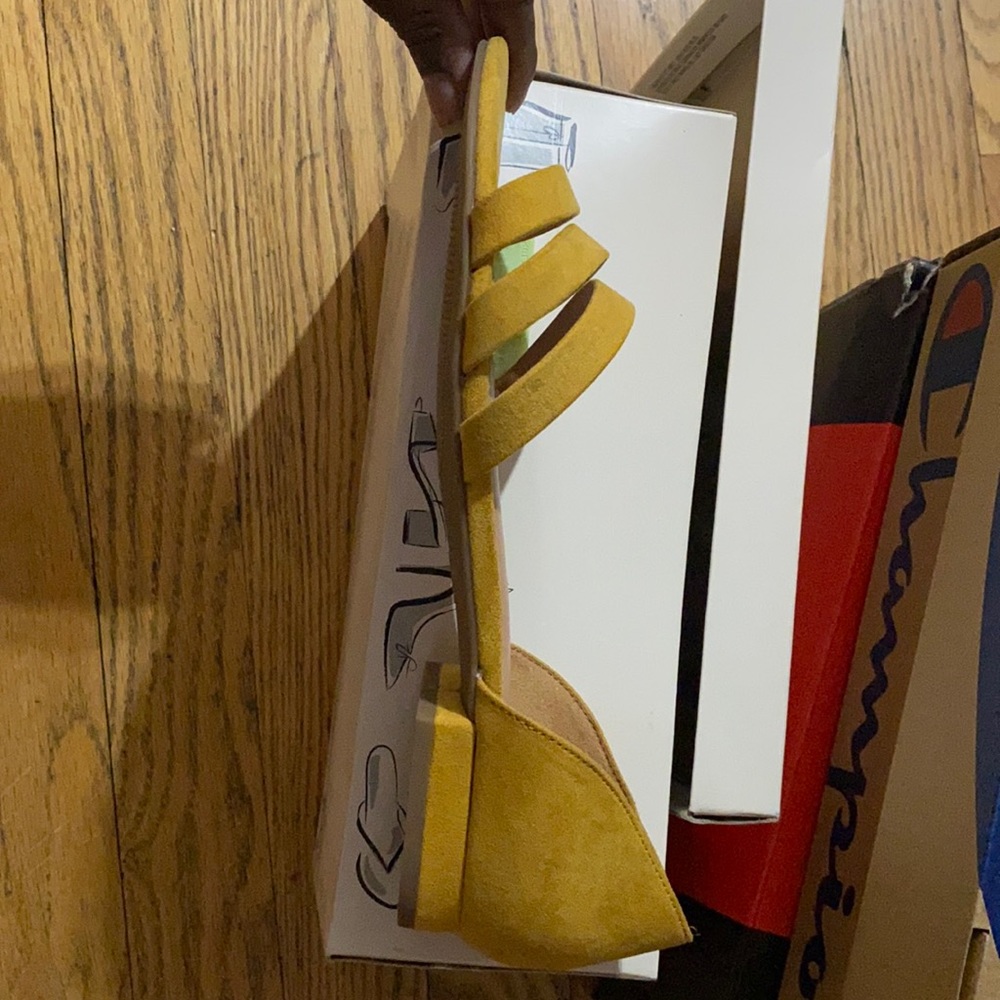 Never been worn. Stylish mustard yellow summer sandal.